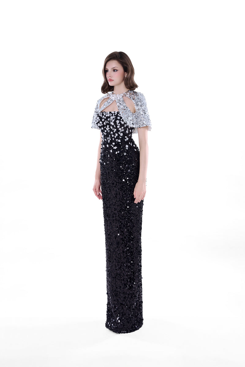 Black Luna floral sequin gown by HACCHIC COUTURE, featuring intricate floral patterns and a flowing maxi dress silhouette.