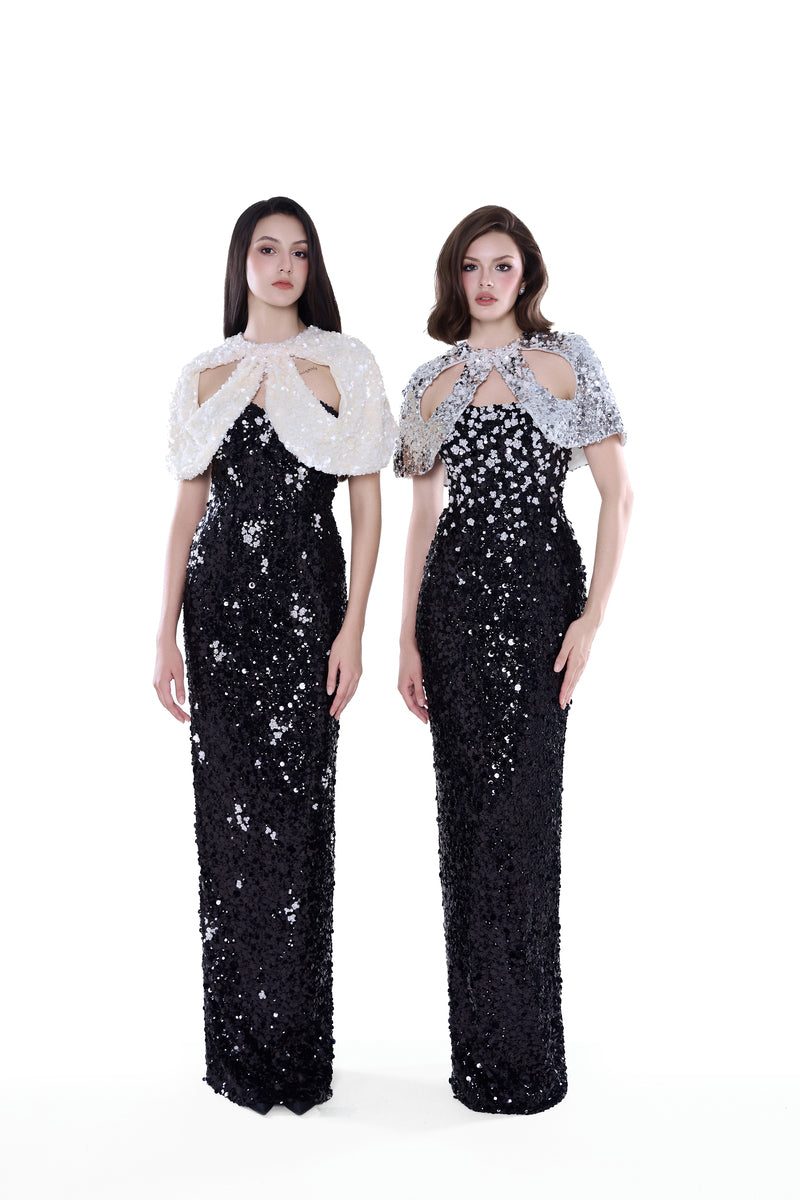 Black and silver Luna Crystal Cape Gown by HACCHIC COUTURE featuring flowing maxi dress with crystal embellishments.