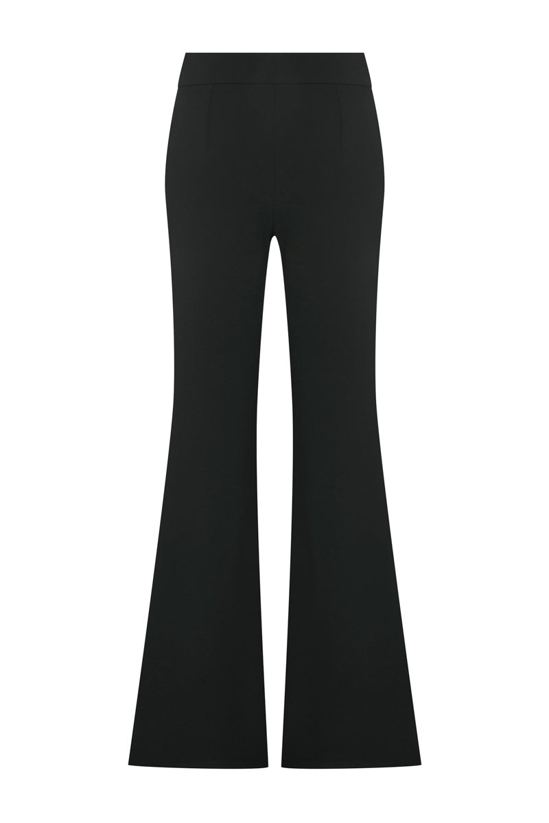 Hand embroidered pants by TAGG featuring intricate embroidery details and a relaxed fit, displayed on a neutral background.