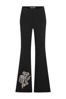 Hand embroidered pants from TAGG featuring intricate embroidery and comfortable fit, showcased in this detailed product image.