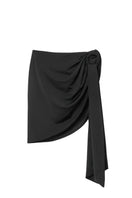 Seaquelle Haven mini skirt in pearl black, a stylish cover-up with a sleek, fitted design perfect for beach or poolside wear.