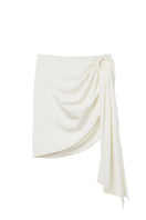 Seaquelle Haven mini skirt in pearl white, a stylish cover-up with a fitted design and soft fabric for beach or poolside wear.