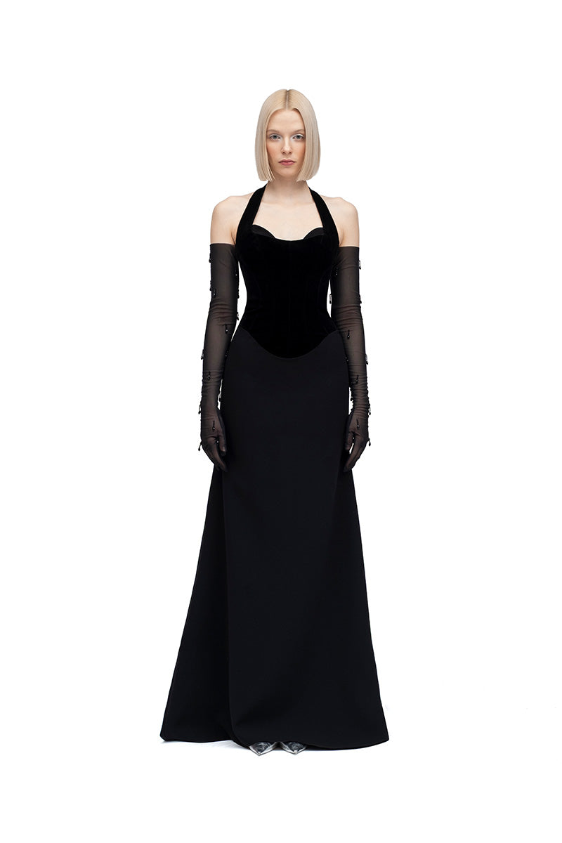 Black HAZAL maxi dress by MOON / HAKAAN YILDIRIM, featuring flowing fabric and elegant design, shown on a model.