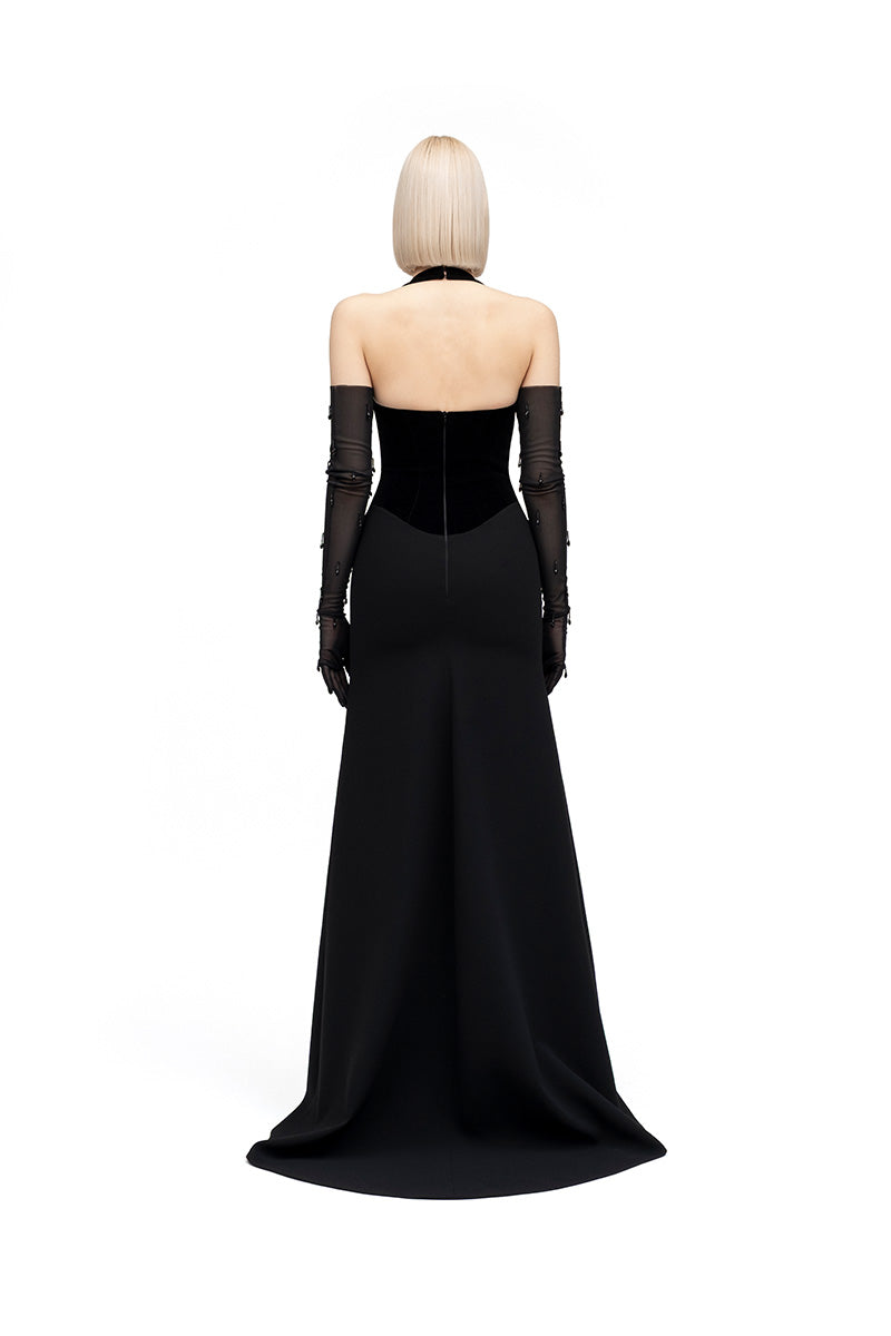 Black Hazal maxi dress by Moon Hakaan Yildirim, flowing fabric and elegant design, shown on a model.
