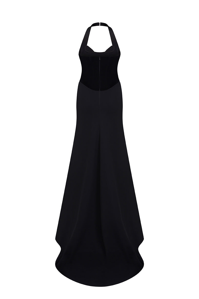 Black HAZAL maxi dress by MOON / HAKAAN YILDIRIM, shown from the back with flowing fabric and elegant design.