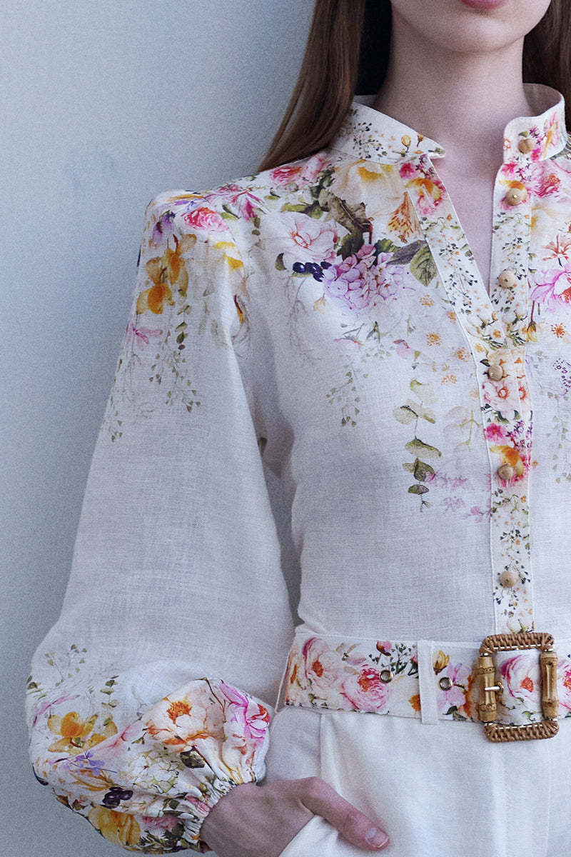 AISA Hazel shirt displayed on a hanger, featuring a stylish, casual design with a collar and button-down front.