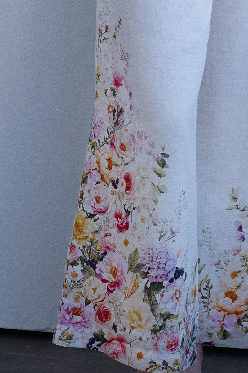 AISA Hazel pants featuring a stylish, tailored design with a relaxed fit in neutral fabric, displayed on a model.