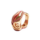 Sara & Flora terracotta heirloom spiral ring with intricate design, showcasing warm earthy tones and handcrafted craftsmanship.