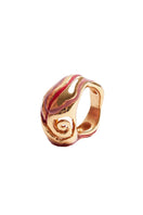 Sara & Flora terracotta heirloom spiral ring with intricate design, showcasing warm earthy tones and handcrafted craftsmanship.