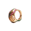 Green heirloom Espiral ring by Sara & Flora, featuring a detailed spiral design in vibrant green metal.