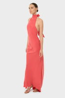 Coral AQUAFLORA halter neck slip maxi dress by niLuu, featuring a flowing silhouette and elegant design.