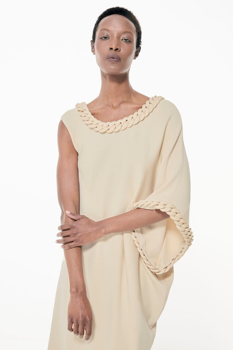 Leem off-white knit maxi dress with chain detail, featuring a comfortable, stylish design perfect for elegant casual wear.
