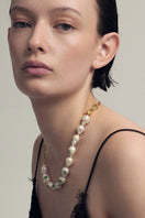 Gold Half Delta Necklace by Fenomena featuring a sleek, modern geometric design on a delicate chain.
