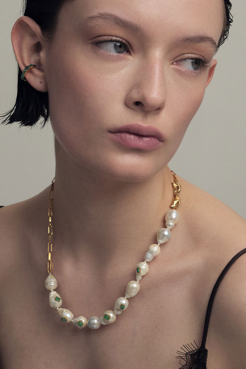 Gold Half Delta Necklace by Fenomena featuring a sleek, modern design with a delicate chain and geometric pendant.