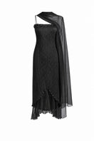 Black twisted pleat midi dress from Stolen Stores featuring hand-pleated fabric and a sleek, elegant silhouette.