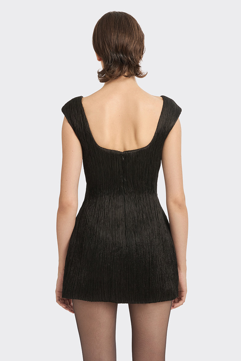 Black hand-pleated mini dress by Stolen Stores, showcasing a stylish, textured design with a fitted silhouette.