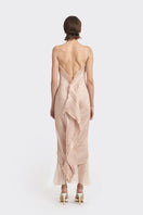 Light pink twisted pleat midi dress by Stolen Stores, featuring elegant hand-pleated fabric and a stylish midi length.