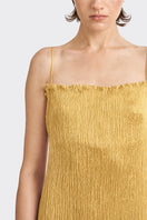 Gold hand-pleated midi dress by Stolen Stores from the CULT MIA X collection, shown on a model.