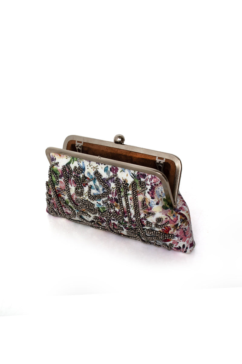 Multicolor clutch bag with happiness crystals on Sarah's Bag Wildflower Classic design, featuring intricate floral and crystal details.