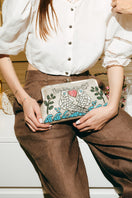 Multicolor Happiness Fish Classic clutch bag by Sarah's Bag featuring vibrant fish design and elegant compact style.