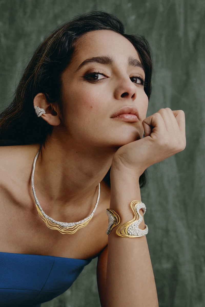 Jude Benhalim Harmonia cuff bracelet featuring intricate metal design and open adjustable style on a neutral background.