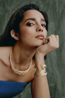 Jude Benhalim Harmonia cuff bracelet featuring intricate metal design and open adjustable style on a neutral background.