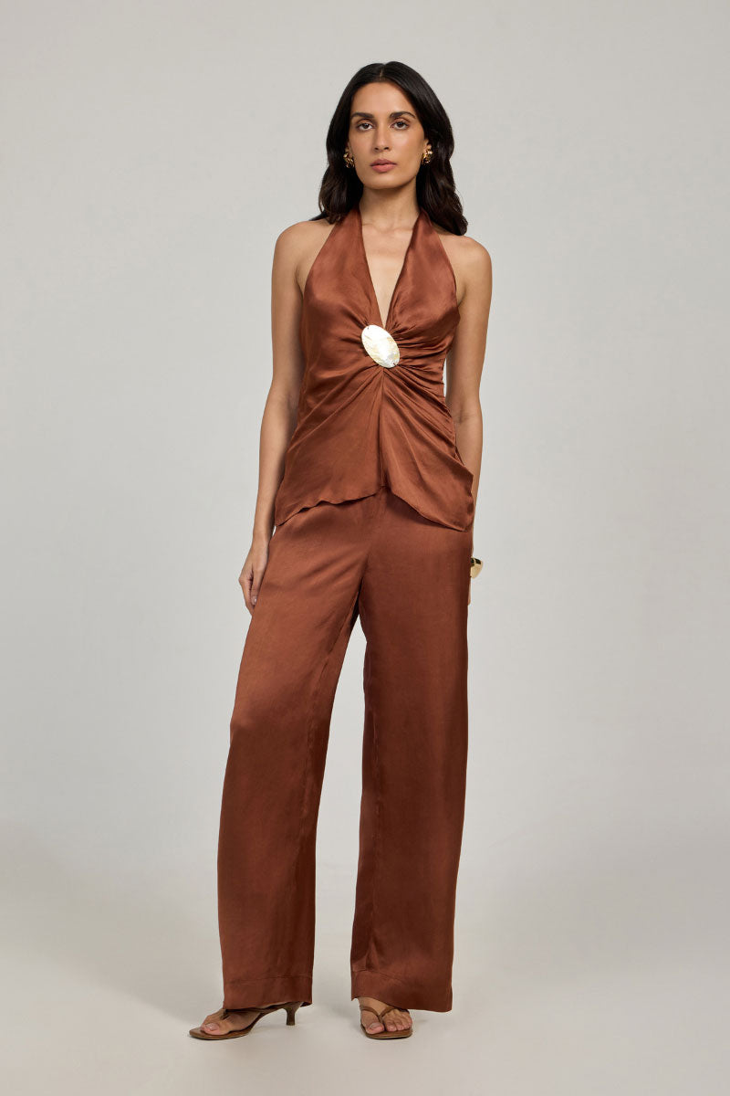 Summer Away Rhode pants in Clay color, showcasing relaxed fit and stylish design on a model.