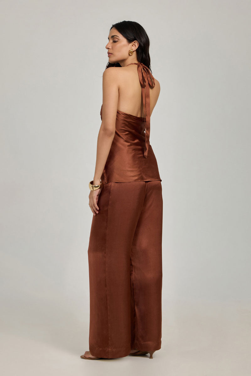 Summer Away Havana top in clay, a stylish sleeveless blouse with a relaxed fit and round neckline, displayed on a hanger.