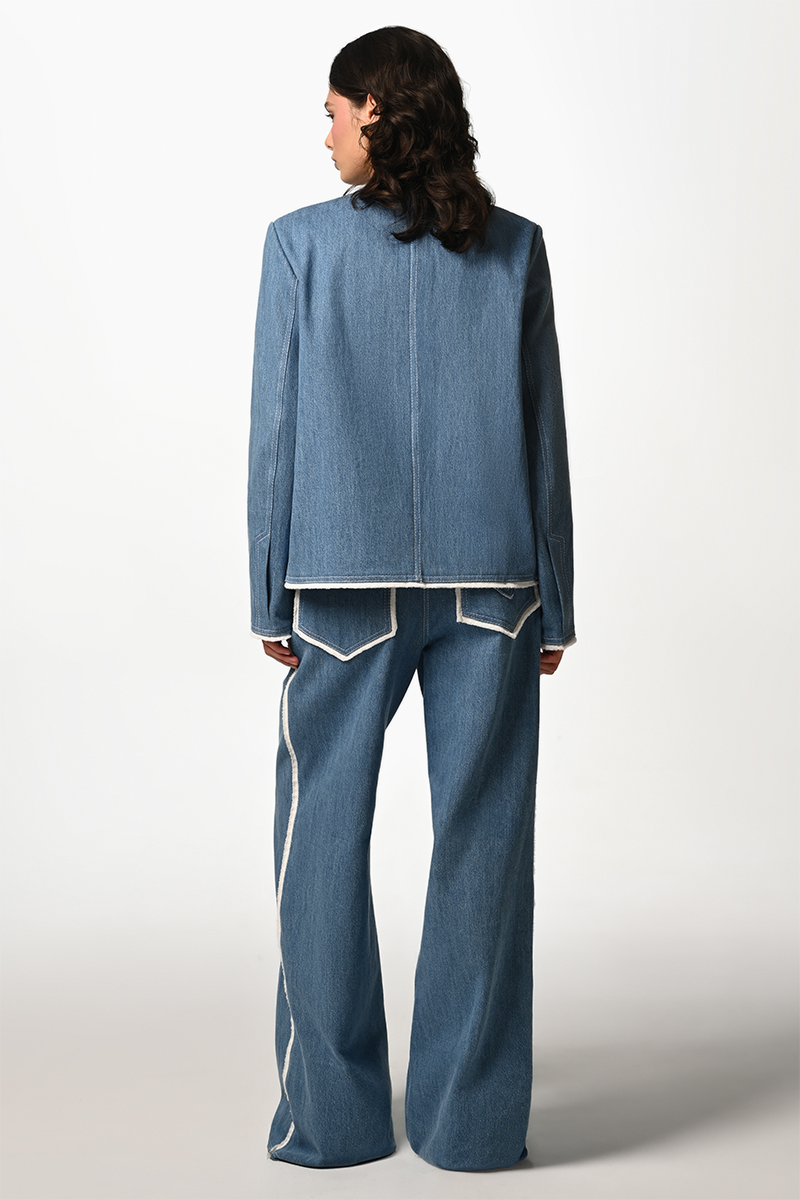 Blue Liya Heart Pocket jeans featuring a classic five-pocket design and a heart-shaped pocket detail.