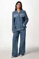 Liya Heart Pocket Jeans in blue showing the front view with heart-shaped pockets and classic denim style.