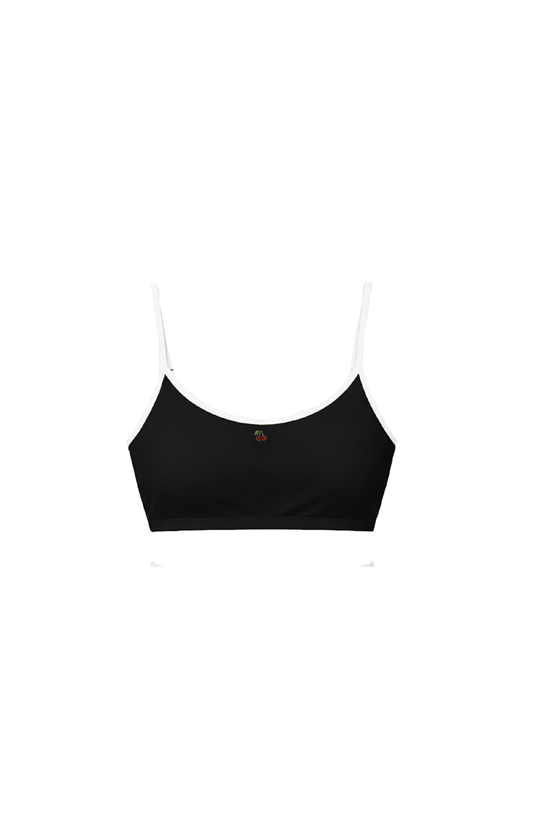 Verdelimon Heaven bikini top in black and white, featuring a stylish design and adjustable straps, front view.