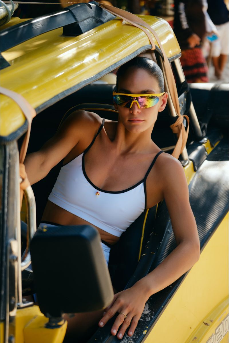 Verdelimon Heaven bikini top in white and black, with adjustable straps and stylish design, paired with matching bikini bottoms.