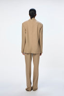 URA Helga top in camel color, stylish women's tops with a relaxed fit and soft fabric, perfect for casual wear.