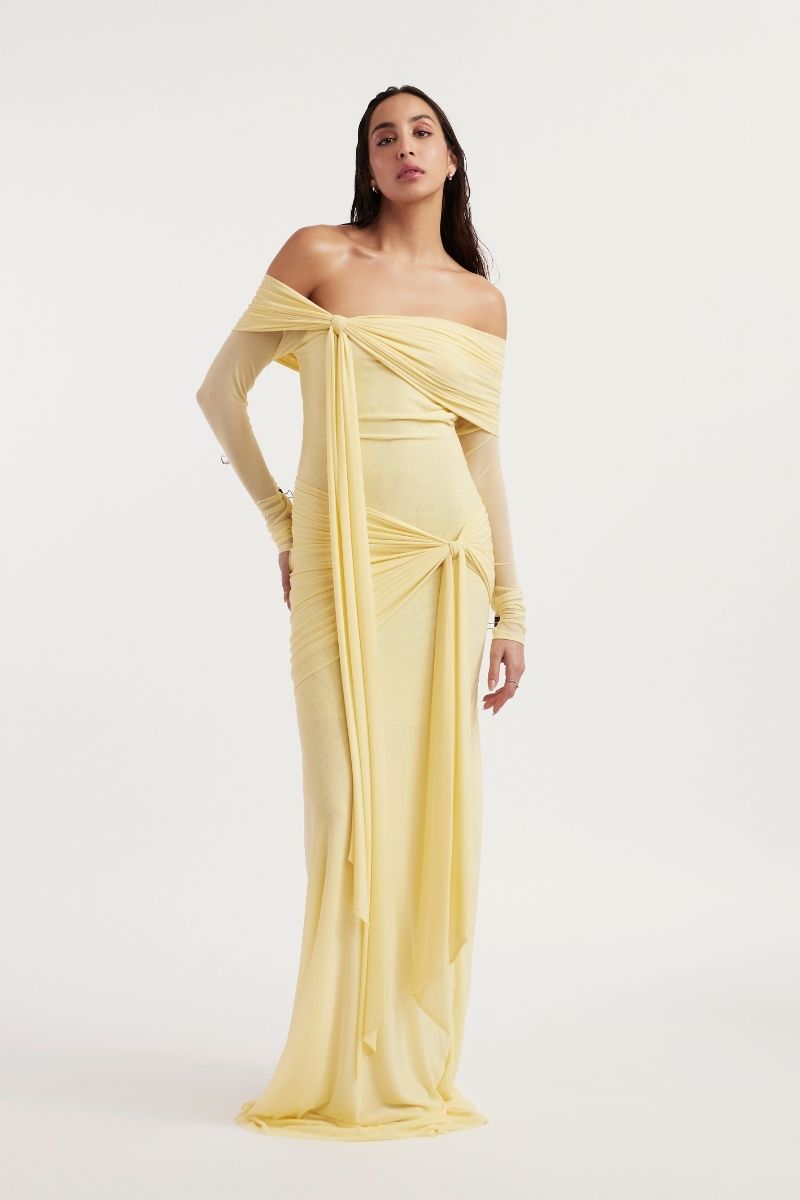 Deme By Gabriella HELOISE maxi dress with flowing fabric and elegant design, shown in a full-length view on a model.