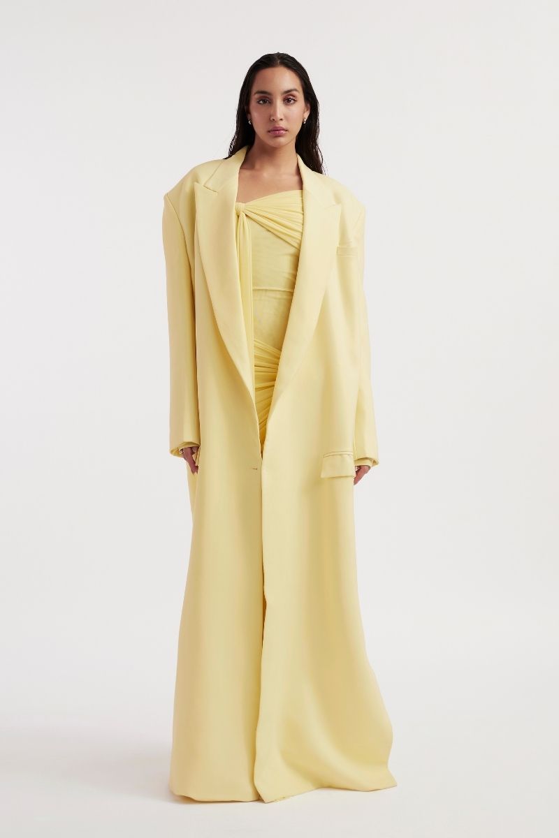 Deme By Gabriella HELOISE Butter Yellow Jacket with long sleeves and front pockets, stylish outerwear for women.