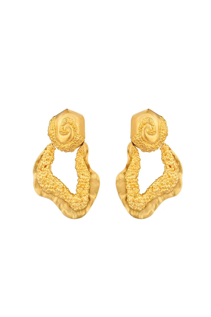 Gold Hera earrings by Jude Benhalim featuring elegant, shiny gold hoops with intricate detailing, displayed on a neutral background.