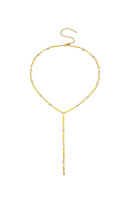 Gold HEX Dangle Drop Necklace by Velvet Desert featuring geometric hexagon design and delicate chain detailing.