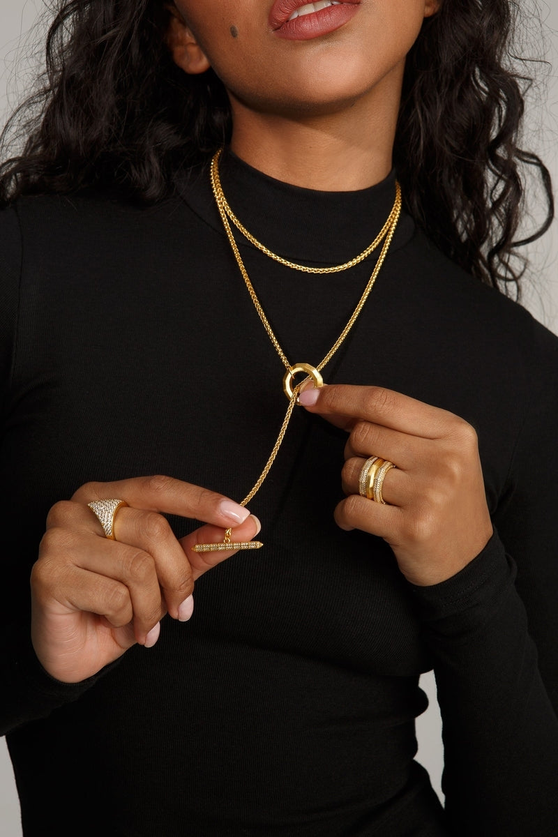 Gold HEX PAVÉ RING by Velvet Desert featuring a geometric hexagon design with sparkling pave embellishments.