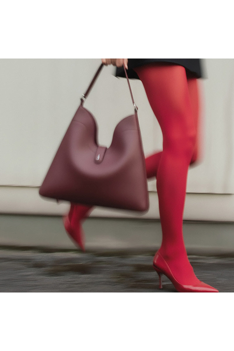 Behn0 New York Melina shoulder bag in nappa leather, brick color, featuring a sleek design and adjustable shoulder strap.