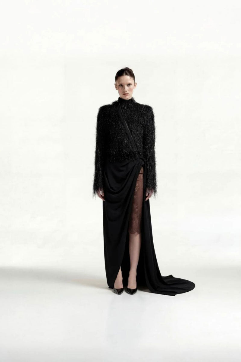 Black high-neck fur top by Tayfun Kaba, showcasing a stylish and cozy tops design with a plush fur collar and sleek fit.