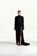 Black high-neck fur top by Tayfun Kaba, showcasing a stylish and cozy tops design with a plush fur collar and sleek fit.