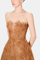 Elegant honey beaded lace gown by Montsand, featuring intricate beading and delicate lace fabric, perfect for formal occasions.