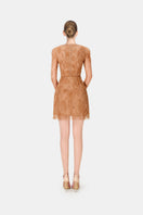 Honey beaded lace mini dress by Montsand, showcasing a fitted silhouette with intricate beadwork and delicate lace fabric.