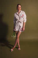 Estefania honey rose blouse with long sleeves and ruffled collar, stylish shirt for casual or formal wear.