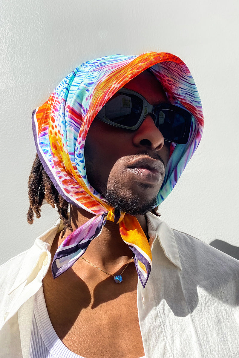 Hot Moussard silk scarf by Amel Batita, featuring vibrant patterns, perfect as a stylish headscarf or accessory.