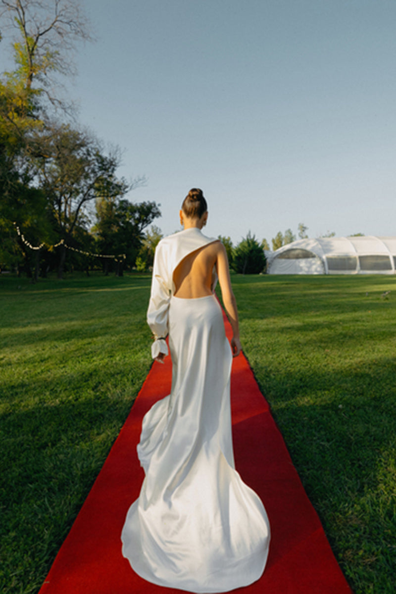 Matters Cannes Pearl Dress gown featuring elegant pearl embellishments and a flowing design, perfect for formal events.