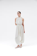 Studio NK Idil Ivory top, stylish sleeveless blouse with a relaxed fit, perfect for casual or office wear.