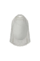 Studio NK Idil Top in ivory, stylish sleeveless blouse with a relaxed fit, displayed on a model.