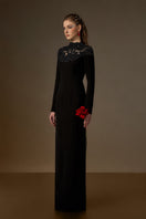 Black crystal-embellished lace column gown by I.H.F featuring intricate detailing and elegant fit.