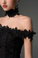 Black off-shoulder floral lace gown by I.H.F Studio, elegant column dress with intricate lace details.